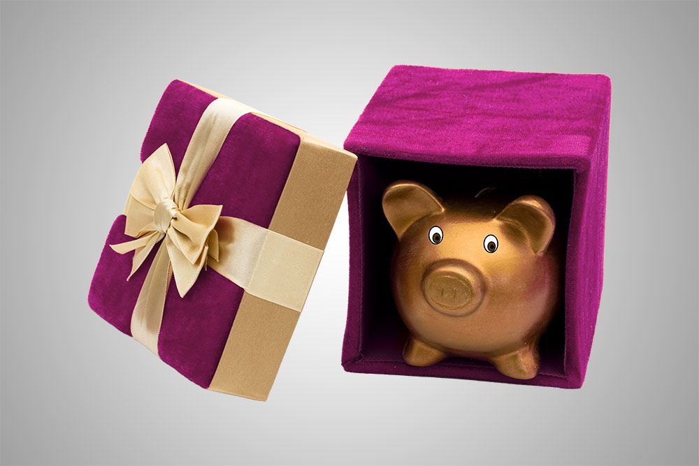 A piggybank coming out of gift box