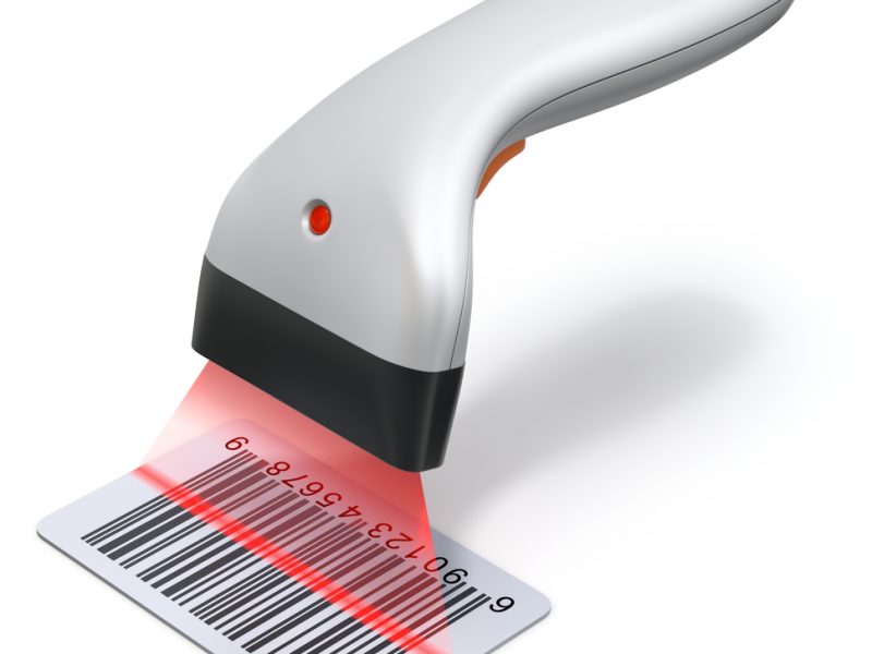 A business person scanning a barcode