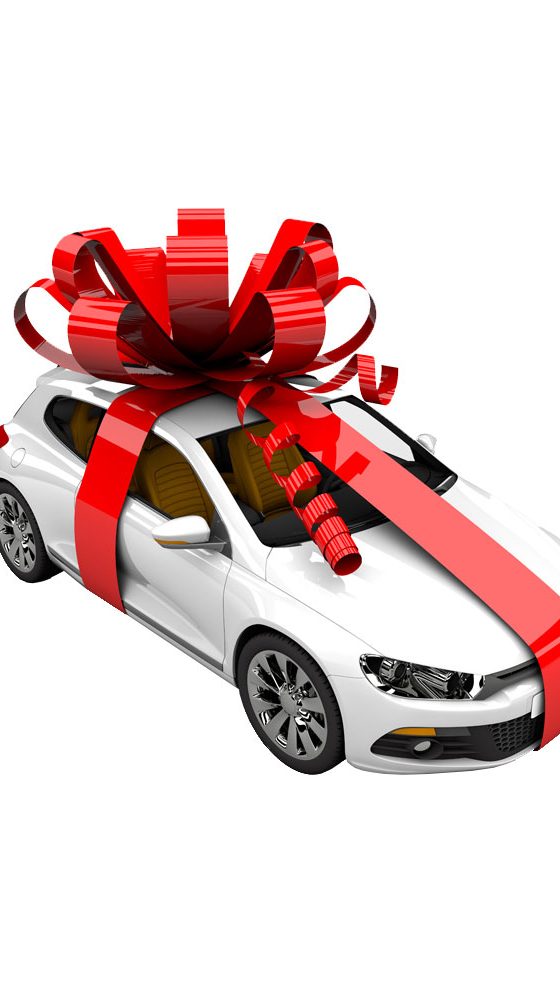 a picture of a car in a huge gift wrap bow