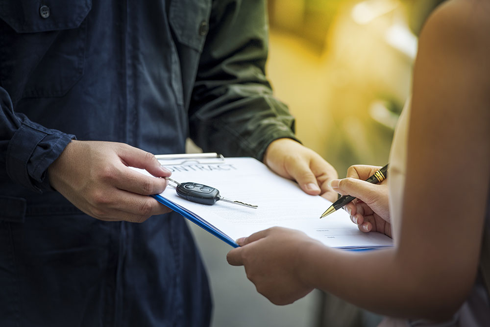 a consumer signing a lease for a car