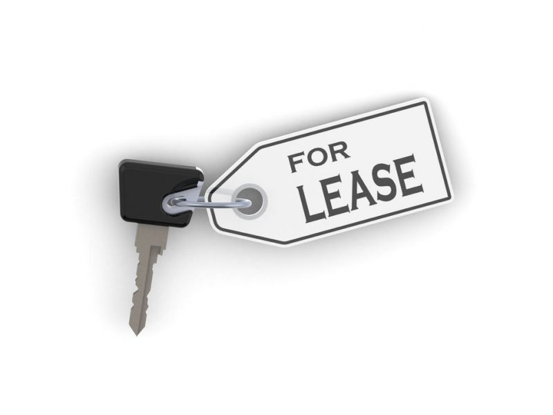 a picture of a car key with a for lease sign