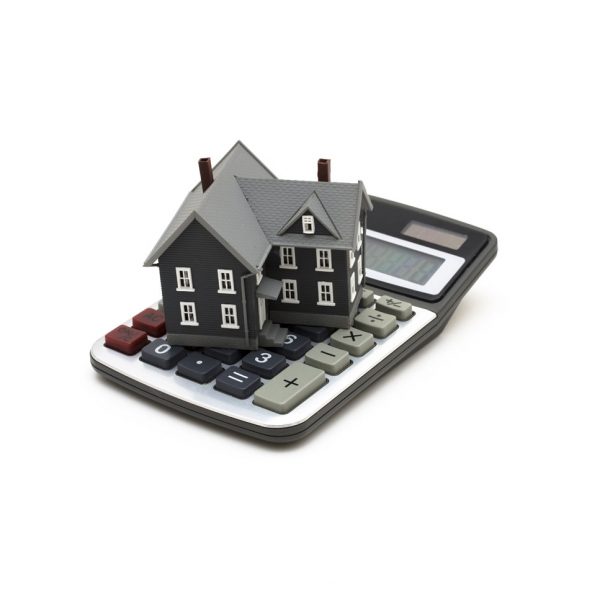 a picture of a house on top of a calculator