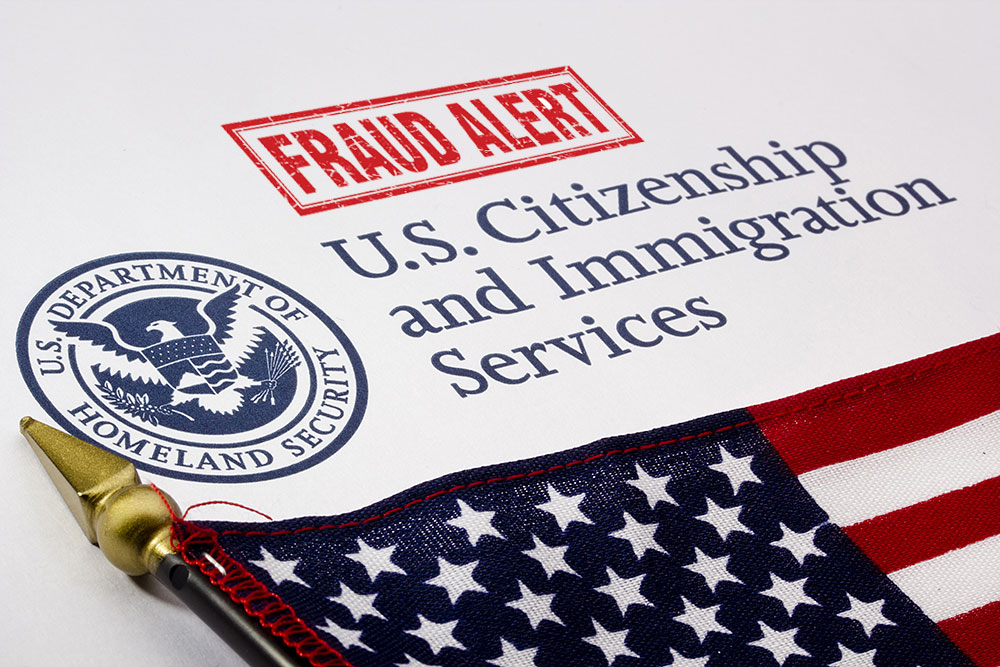 a picture of fraud alert for the United States Citizenship and Immigration Services