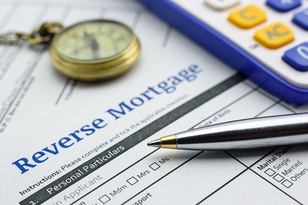 a consumer filling a reverse mortgage application
