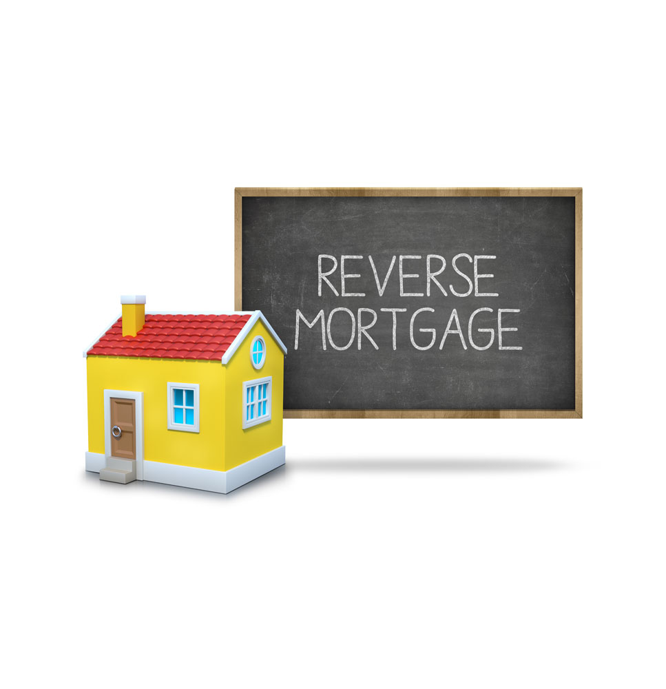 a picture of a house with a blackboard with reverse mortgage written on it