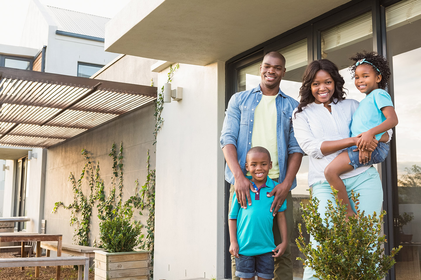 a family outside their home