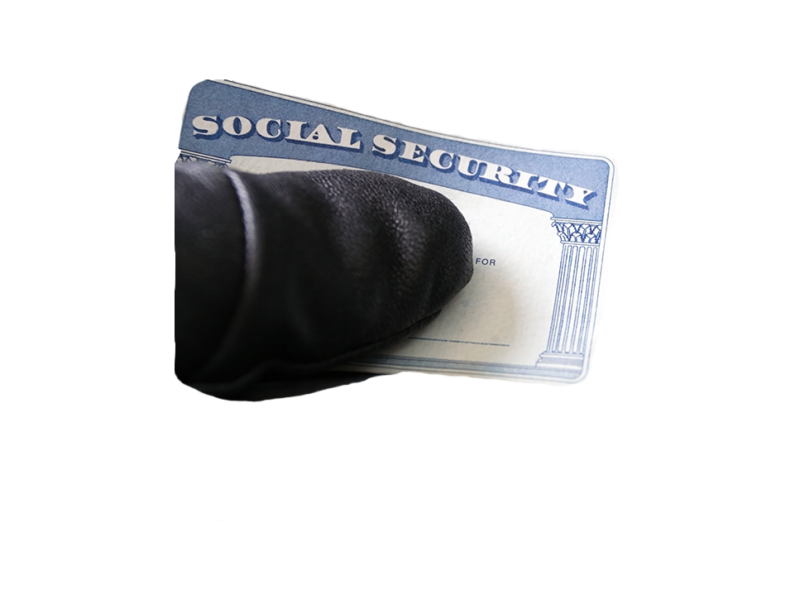 A gloved thumb over a social security card