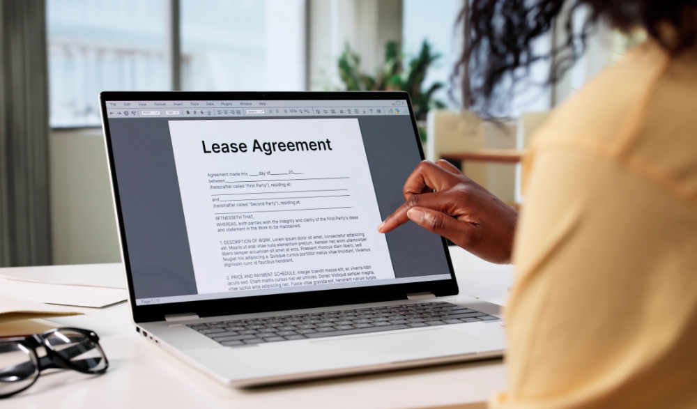 Woman Signing Lease Agreement